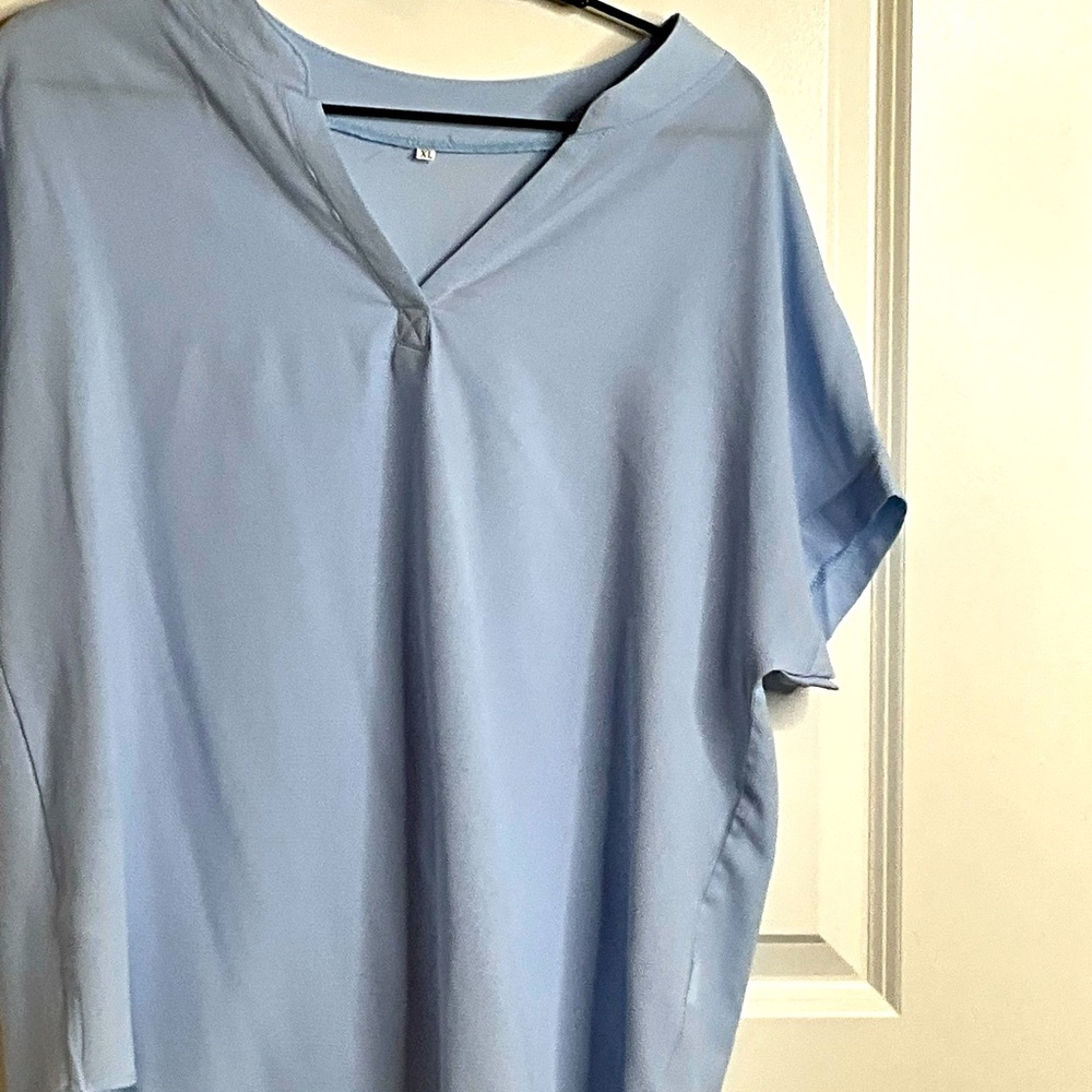 Women’s short sleeve blouse.